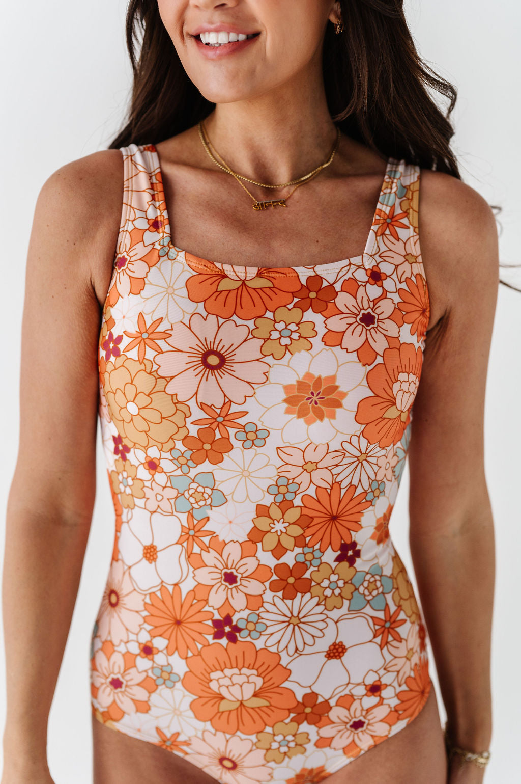 Groovy Floral Cut Back One Piece – Livy&Kate Clothing
